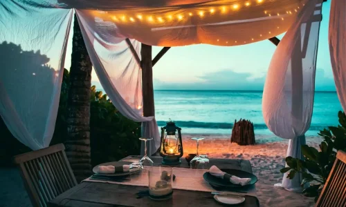 transats de plage à zanzibar au coucher du soleil