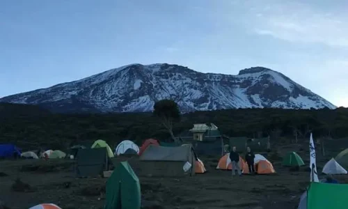 trekkers_resting_on_Kibo_camp_tents